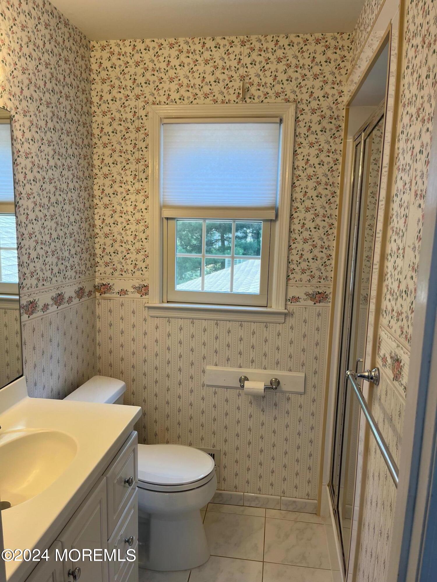 106 Pear Street Oakhurst, NJ 07755 - Photo 18 of 21 a bathroom with a toilet and a shower