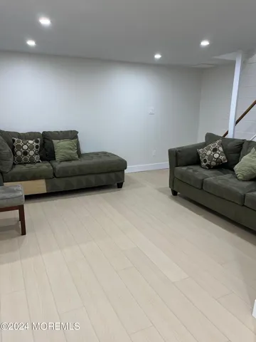a living room with furniture and a couch