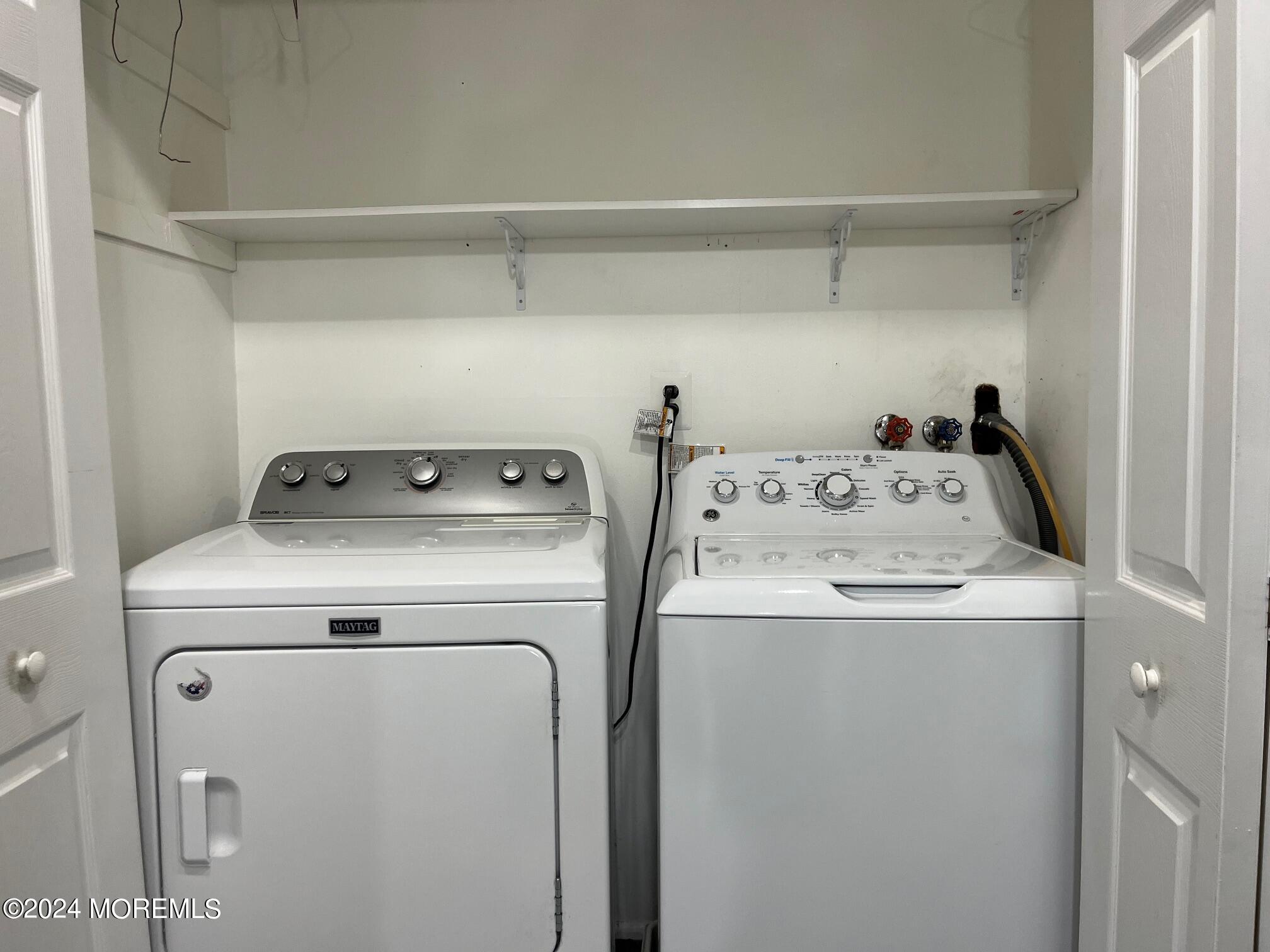 106 Pear Street Oakhurst, NJ 07755 - Photo 20 of 21 a utility room with dryer and washer