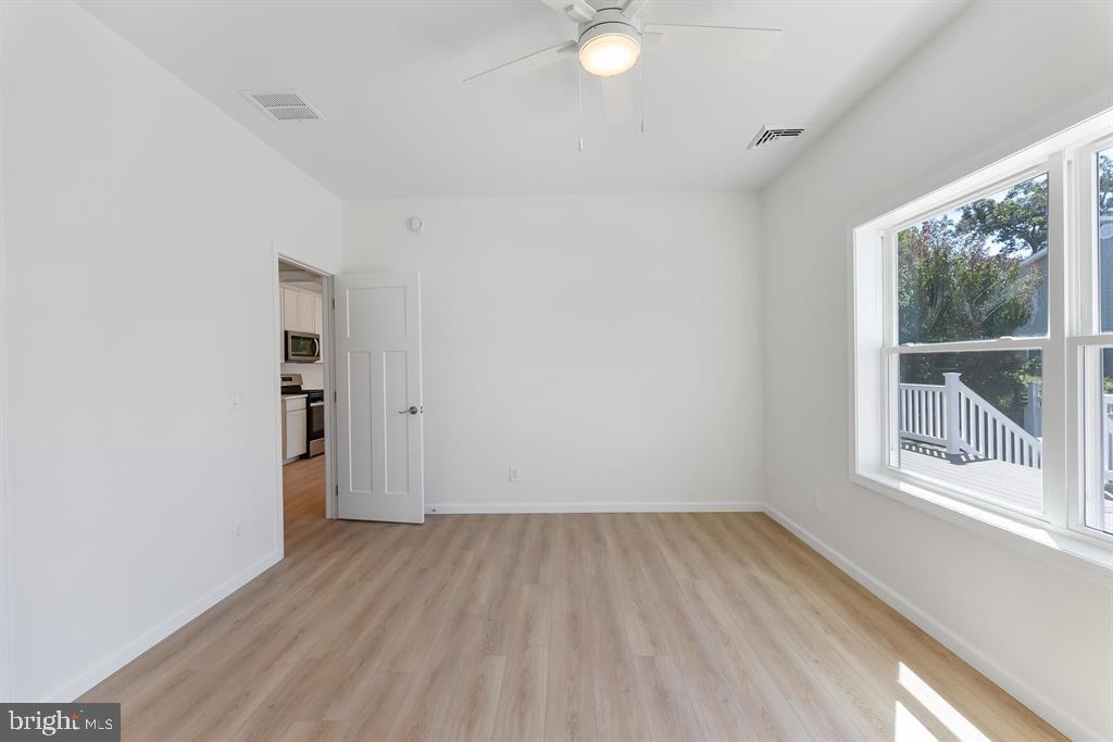 206 Frances Avenue, Unit A Villas, NJ 08251 - Photo 20 of 48 a view of a room with wooden floor and windows