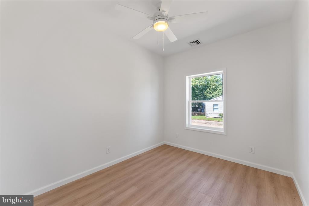 206 Frances Avenue, Unit A Villas, NJ 08251 - Photo 26 of 48 an empty room with a window