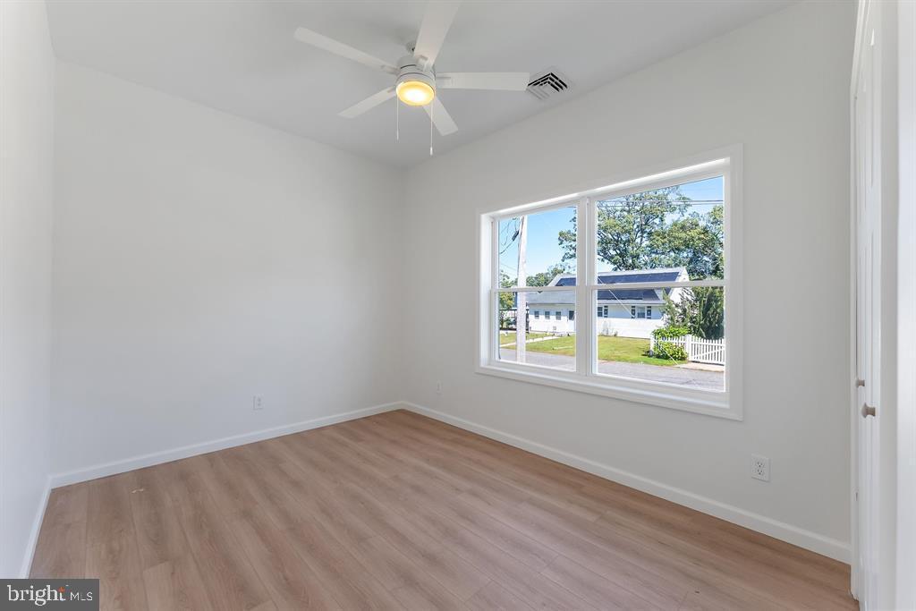 206 Frances Avenue, Unit A Villas, NJ 08251 - Photo 29 of 48 an empty room with a window