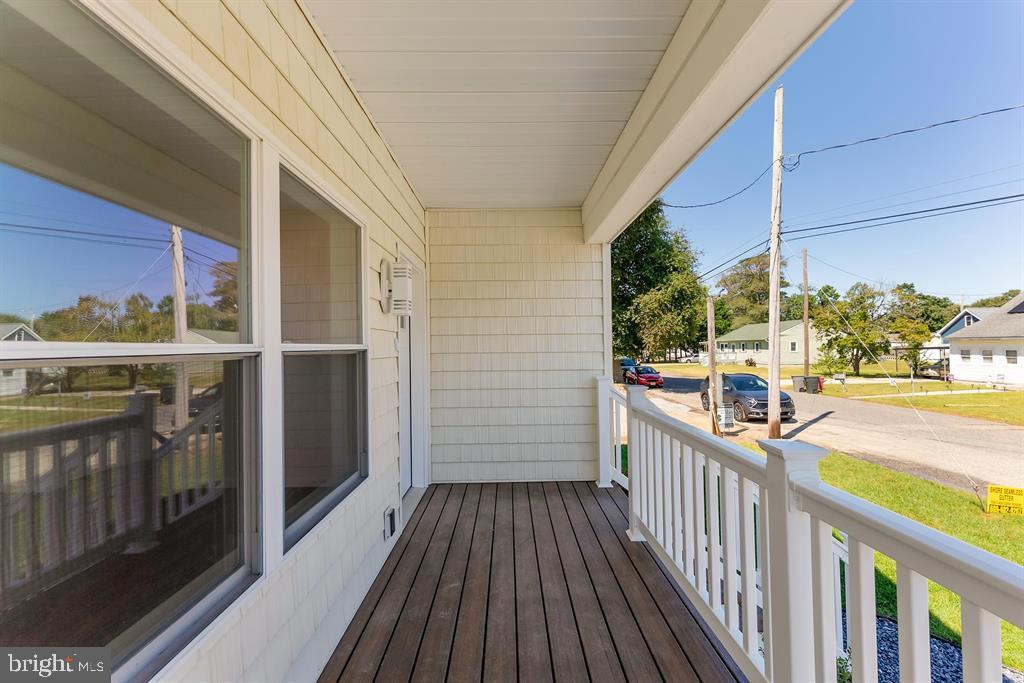 206 Frances Avenue, Unit A Villas, NJ 08251 - Photo 34 of 48 a view of a balcony with wooden floor