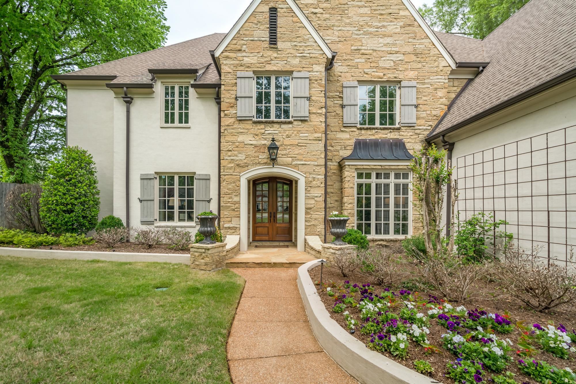 4410 Barfield Road Memphis, TN 38117 - Photo 2 of 25 a front view of a house with garden