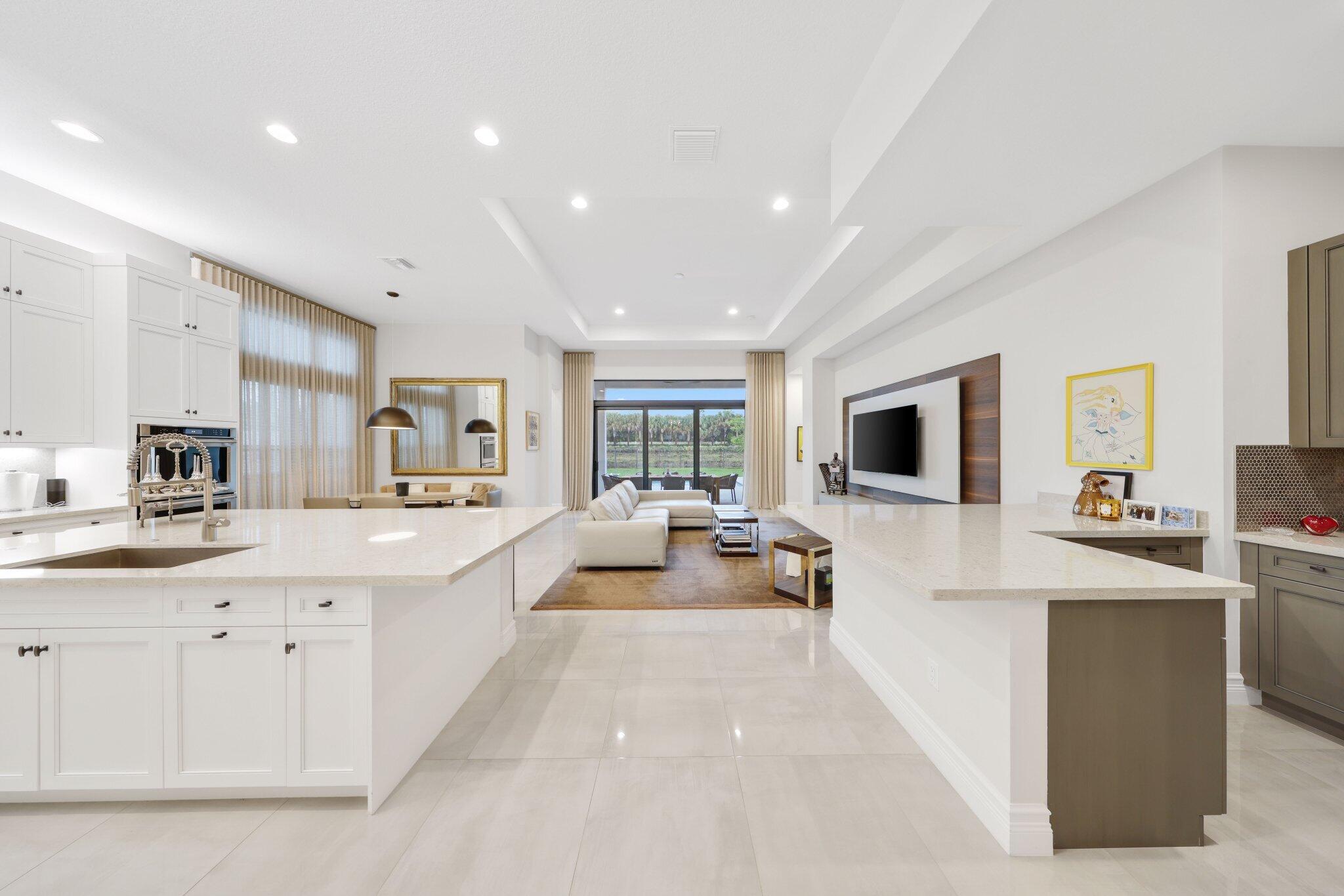 9137 Benedetta Place Boca Raton, FL 33496 - Photo 5 of 48 Kitchen to Family Room View