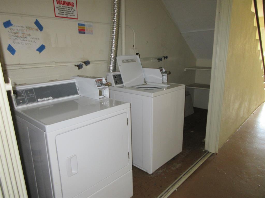 4240 Woodside Drive, Unit 4 Coral Springs, FL 33065 - Photo 12 of 13 a utility room with dryer and washer