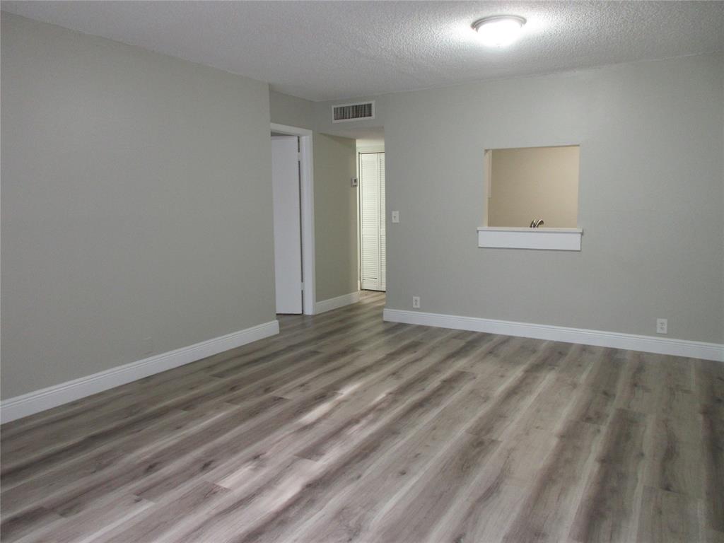 4240 Woodside Drive, Unit 4 Coral Springs, FL 33065 - Photo 4 of 13 a view of room with window and ceiling fan