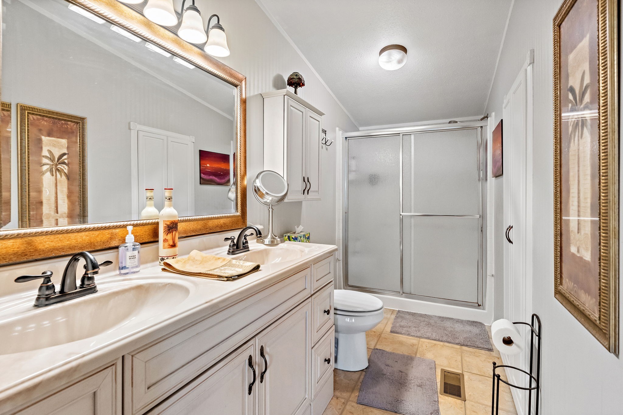 1333 Roberts Road Goodlettsville, TN 37072 - Photo 29 of 80 a bathroom with a double vanity sink mirror and toilet