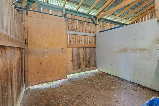 a view of a swimming pool with a yard