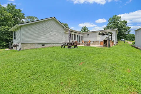 a view of a green field with lots of green space