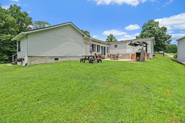 a view of a green field with lots of green space