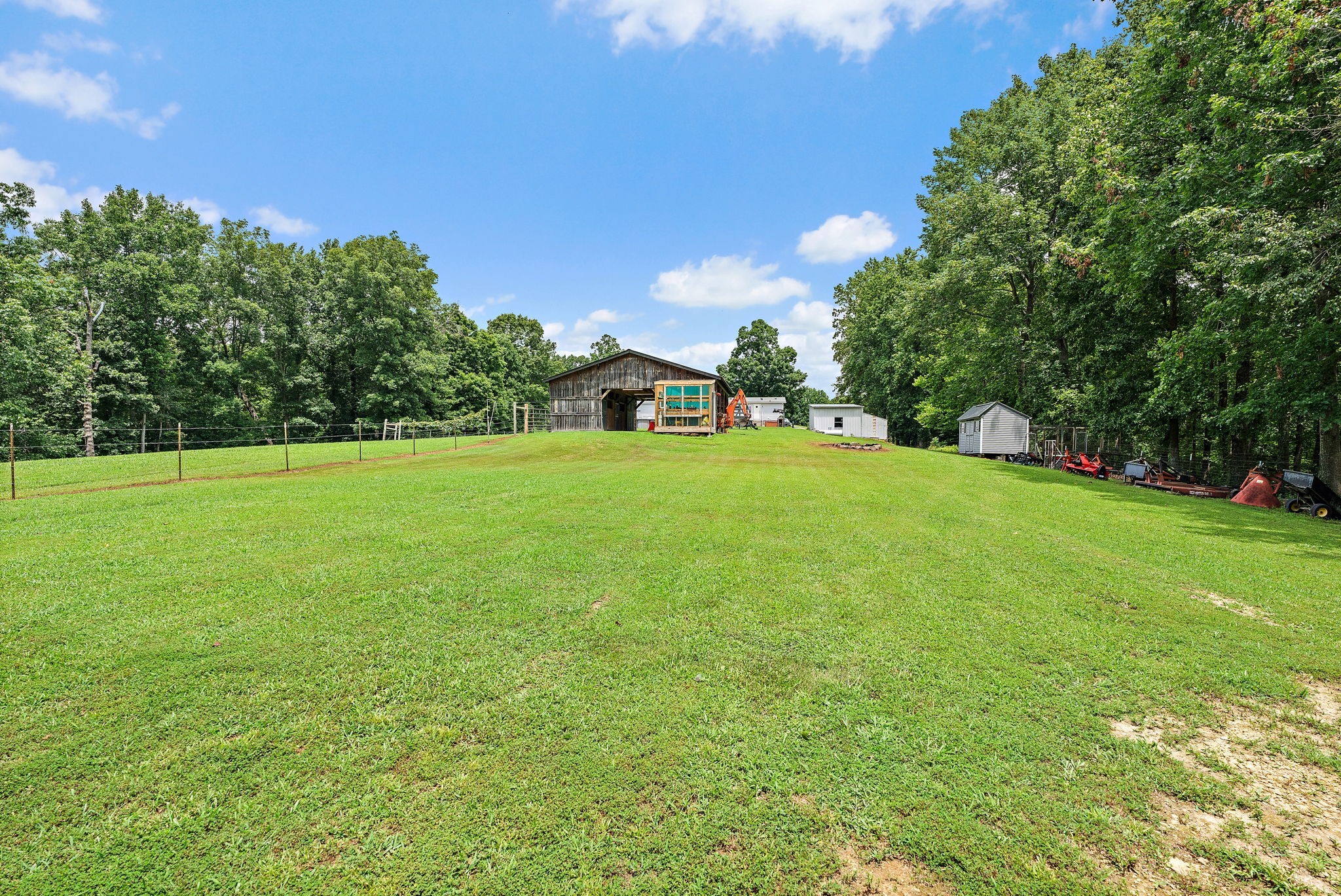 1333 Roberts Road Goodlettsville, TN 37072 - Photo 59 of 80 a view of a field with plants and trees in the background
