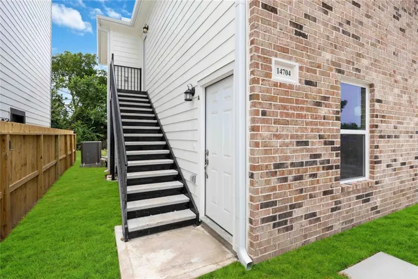 a view of a backyard with stairs