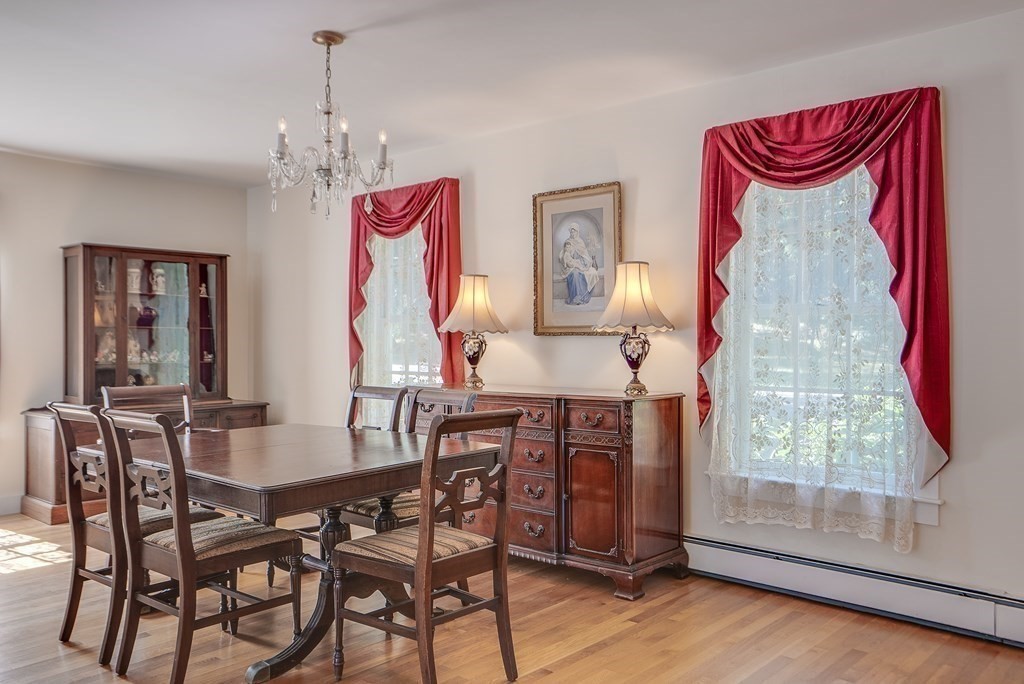 163 Still River Road Harvard, MA 01451 - Photo 14 of 42 a view of a dining room with furniture window and wooden floor