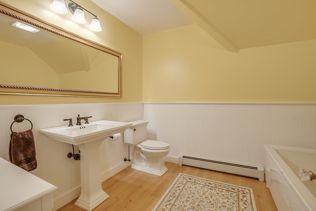 163 Still River Road Harvard, MA 01451 - Photo 29 of 42 a bathroom with a sink toilet and mirror