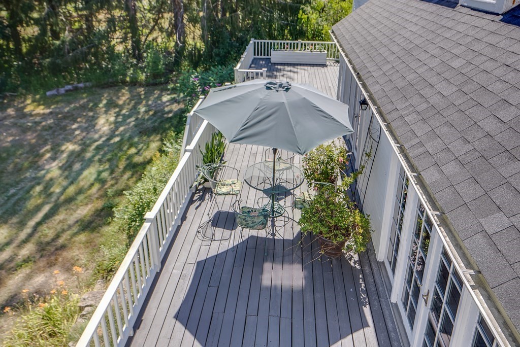 163 Still River Road Harvard, MA 01451 - Photo 3 of 42 a view of balcony with wooden floor and fence