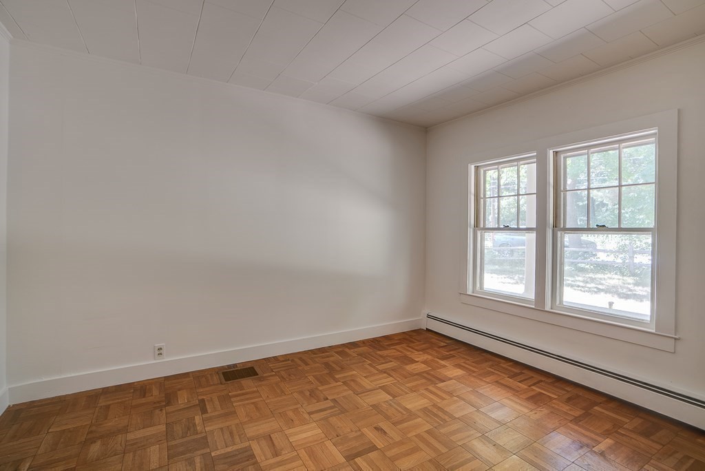 163 Still River Road Harvard, MA 01451 - Photo 37 of 42 an empty room with a empty space and windows