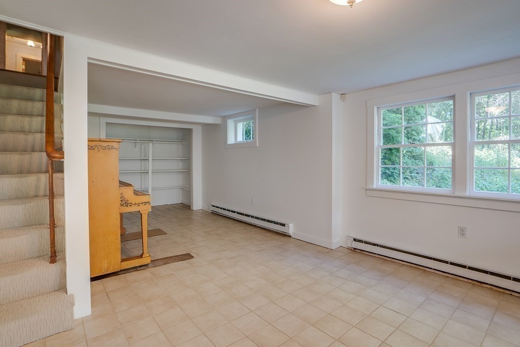 163 Still River Road Harvard, MA 01451 - Photo 38 of 42 an empty room with windows