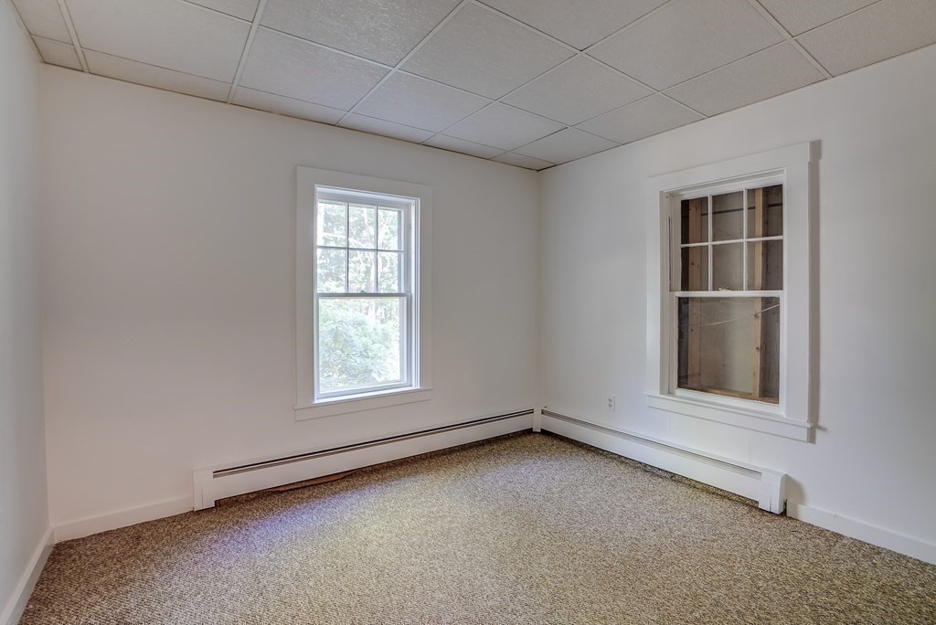 163 Still River Road Harvard, MA 01451 - Photo 39 of 42 an empty room with a window