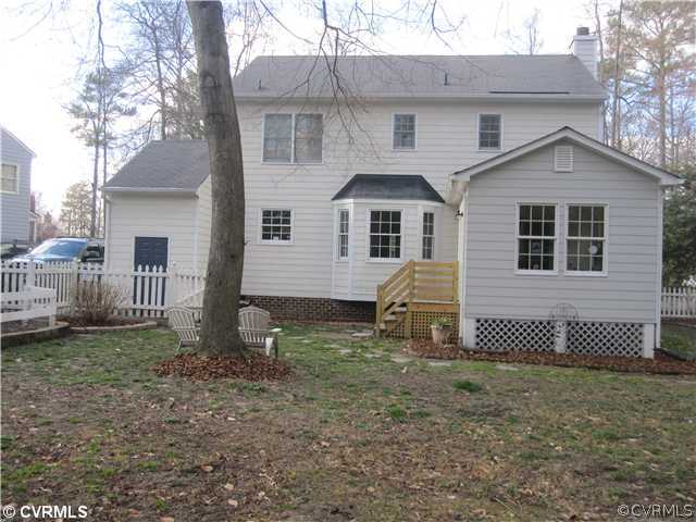 9279 Drawbridge Road Mechanicsville, VA 23116 - Photo 14 of 14 a front view of a house with a yard