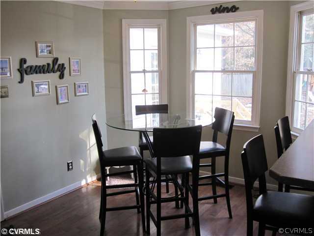 9279 Drawbridge Road Mechanicsville, VA 23116 - Photo 6 of 14 a view of a dining room with furniture and window