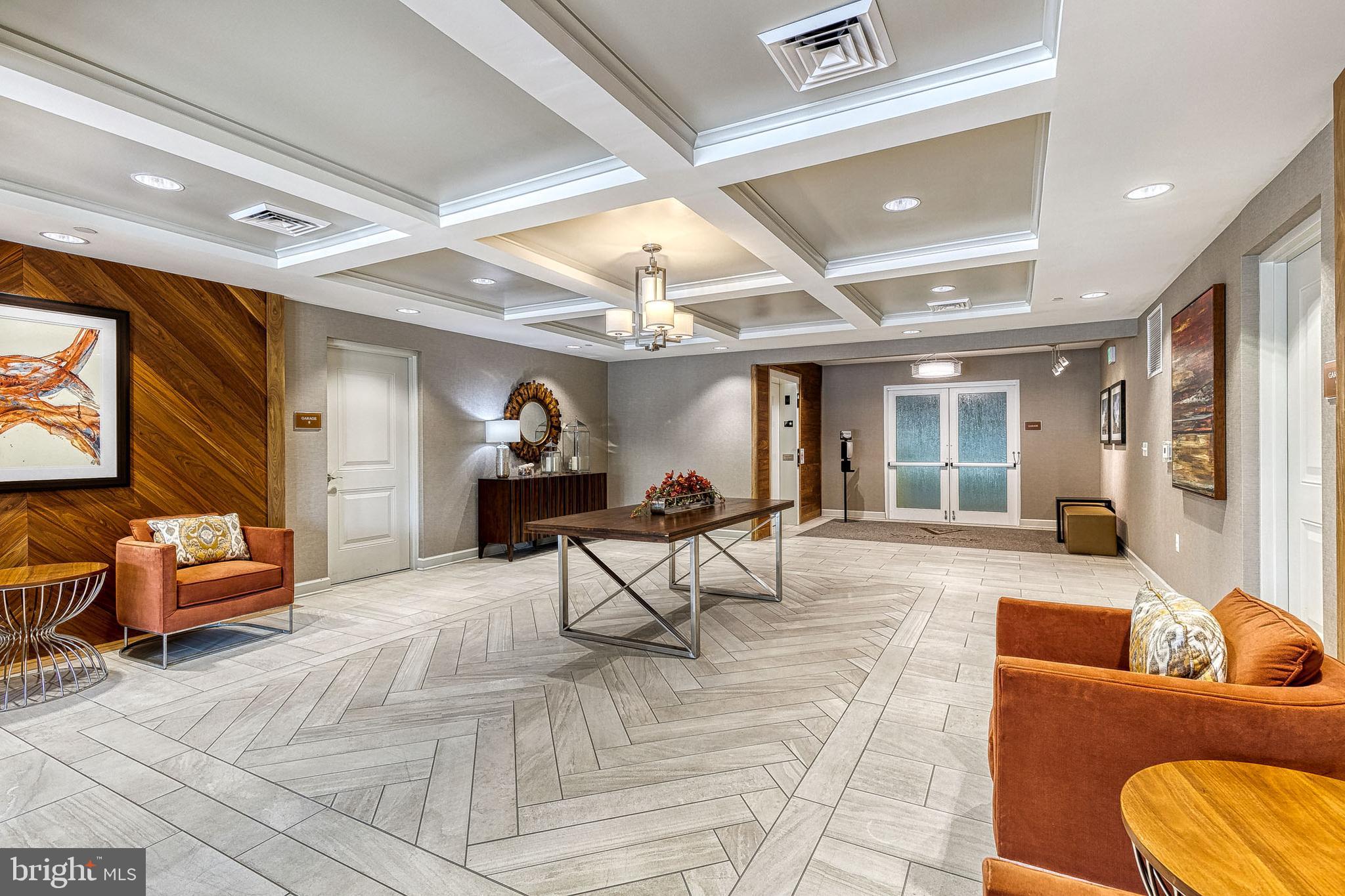 10530 Resort Road, Unit 104 Ellicott City, MD 21042 - Photo 4 of 49 Building Lobby and Door to Your Private Garage