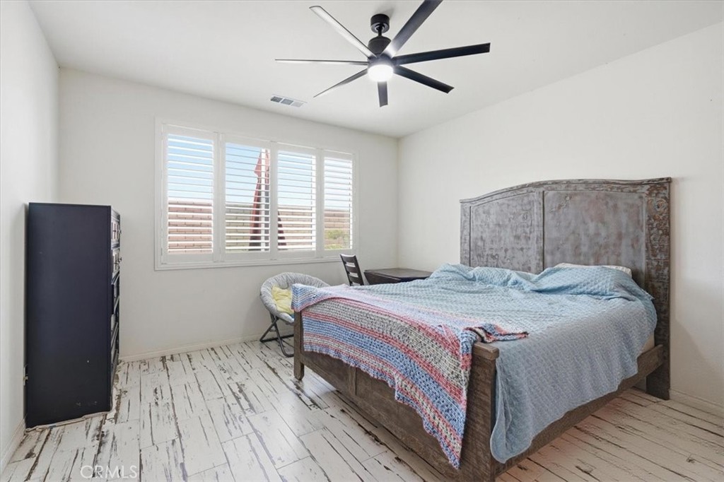 32350 Iron Trail Road Winchester, CA 92596 - Photo 17 of 32 a bedroom with a bed and a window