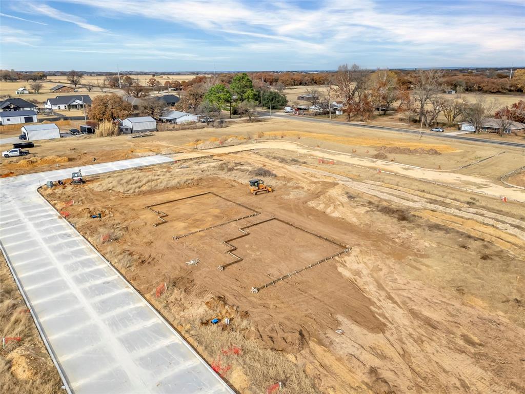809 Lavender Court Tolar, TX 76476 - Photo 6 of 10 a view of an ocean and beach