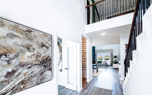 a view of a hallway view with living room and with furniture