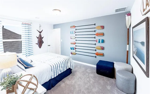 a bedroom with bed and a window