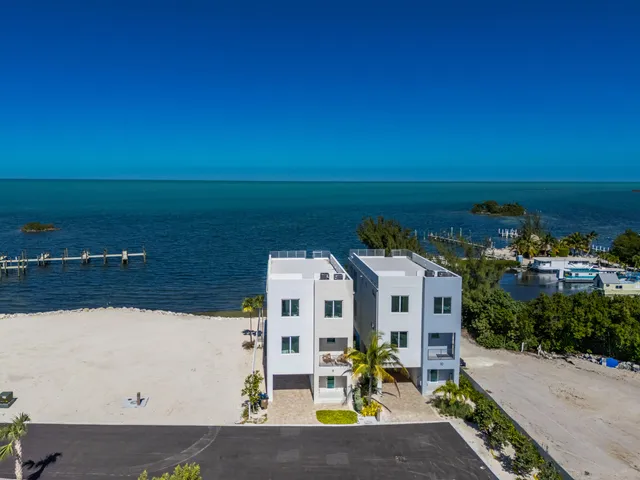 a view of a city with an ocean view