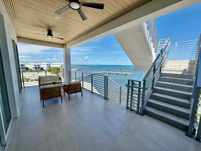 a view of a terrace with outdoor seating
