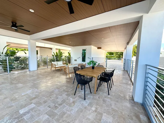 a backyard of a house with lots of green space