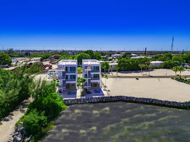 a view of a swimming pool with a yard