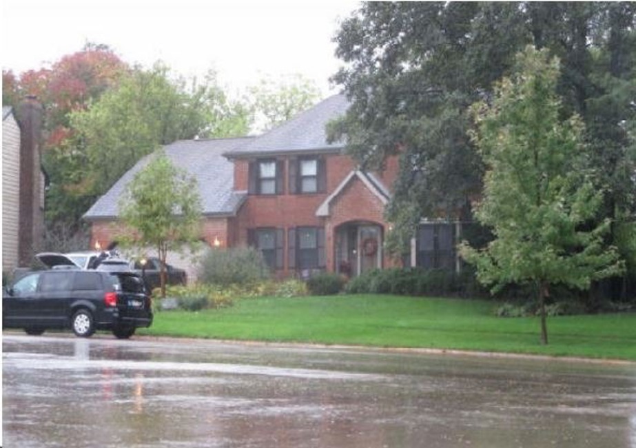 845 Crabtree Lane Cary, IL 60013 - Photo 2 of 2 a front view of a house with a yard and garage