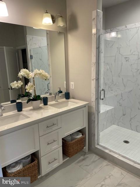 1955 Roland Clarke Place, Unit 29 Reston, VA 20191 - Photo 16 of 27 MASTER BATH WITH DOUBLE SINKS AND SHOWER W/ BENCH