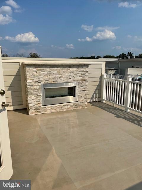 1955 Roland Clarke Place, Unit 29 Reston, VA 20191 - Photo 26 of 27 SKY TERRACE GAS FIREPLACE