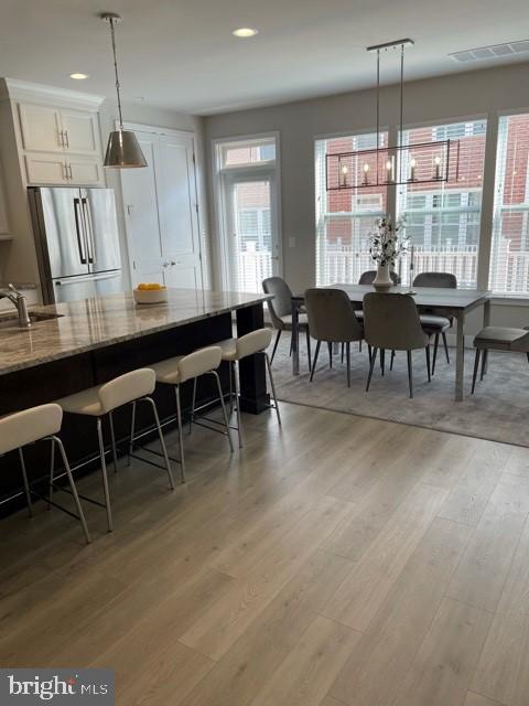 1955 Roland Clarke Place, Unit 29 Reston, VA 20191 - Photo 9 of 27 KITCHEN & DINING AREA