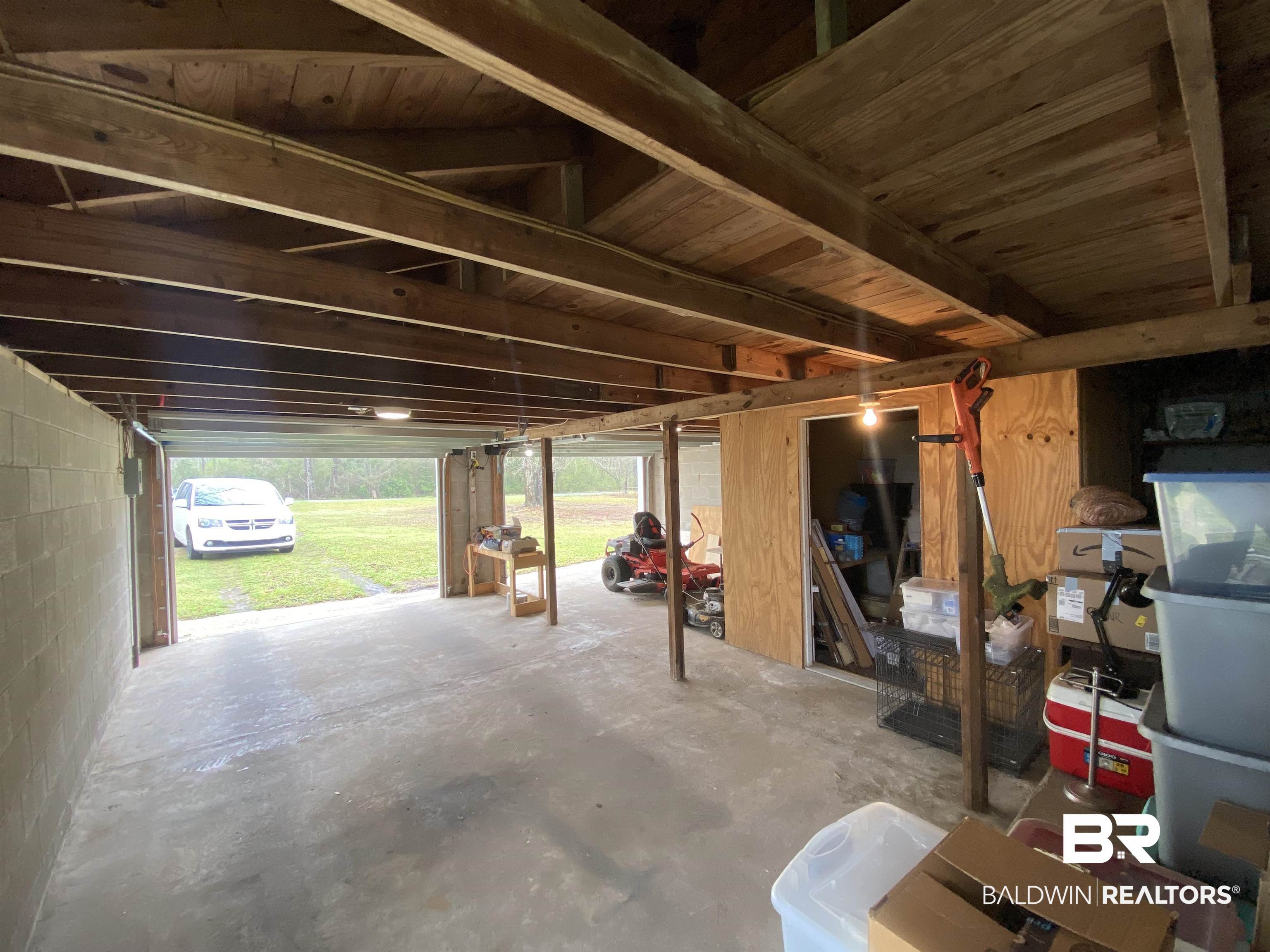 770 Arena Road Frisco City, AL 36445 - Photo 44 of 51 Garage featuring concrete block wall