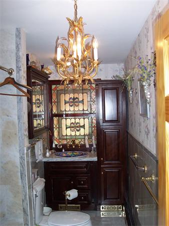 175 Governors Road Quincy, MA 02169 - Photo 10 of 19 a dining room with furniture and chandelier