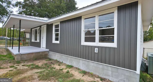 a front view of a house with a porch