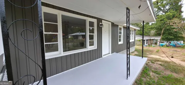 a view of a swimming pool with a lounge chairs
