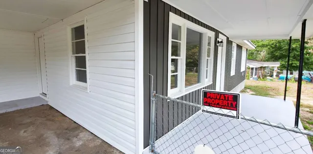 a view of a backyard with a garden