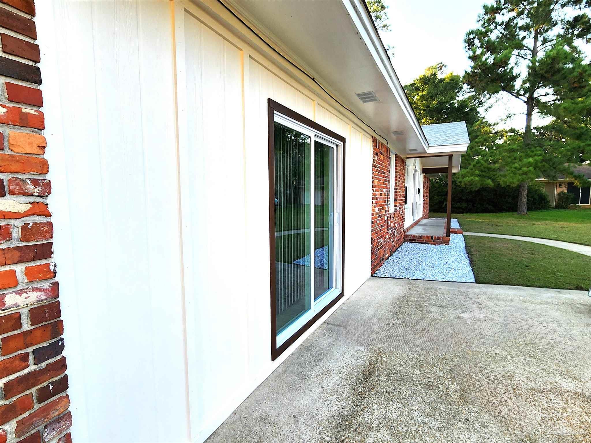 5545 Homewood Road Pensacola, FL 32504 - Photo 4 of 42 New Siding and New Slider