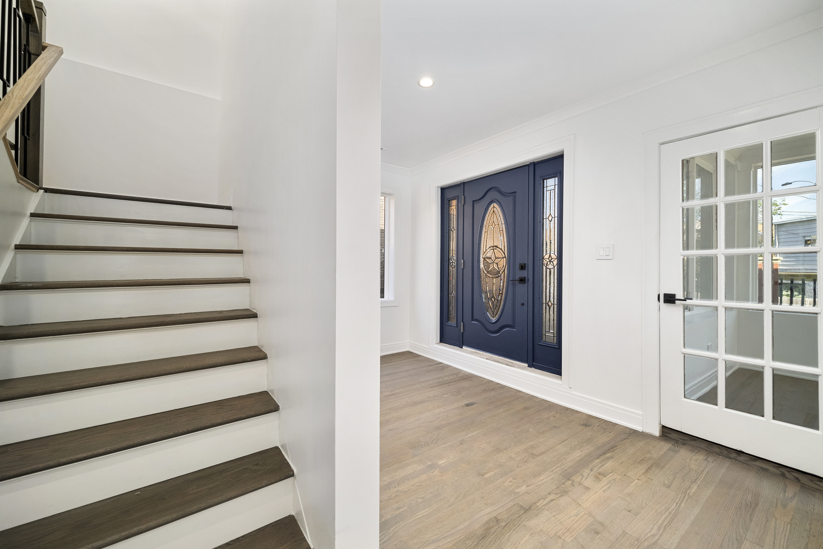 6747 Riverside Drive Berwyn, IL 60402 - Photo 14 of 32 a view of a hallway with wooden floor and entryway