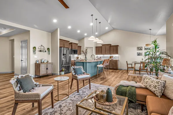 a bed room with a bed and a chair