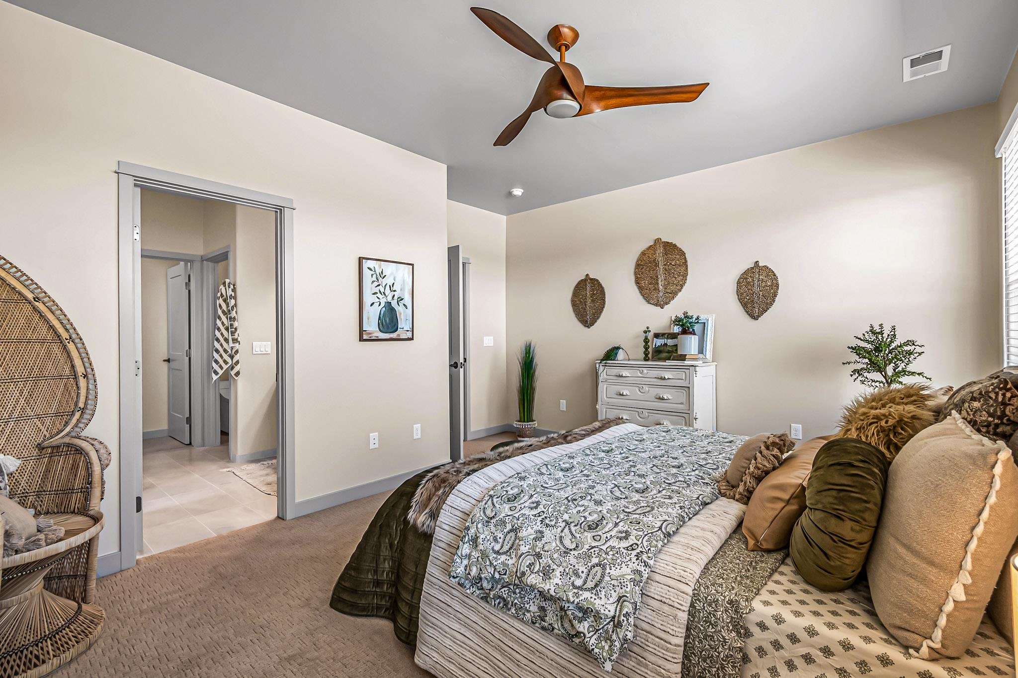 1997 Tomochic Drive Fruita, CO 81521 - Photo 13 of 22 a bedroom with a large bed and a mirror