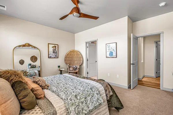 a bathroom with a tub a sink and a shower