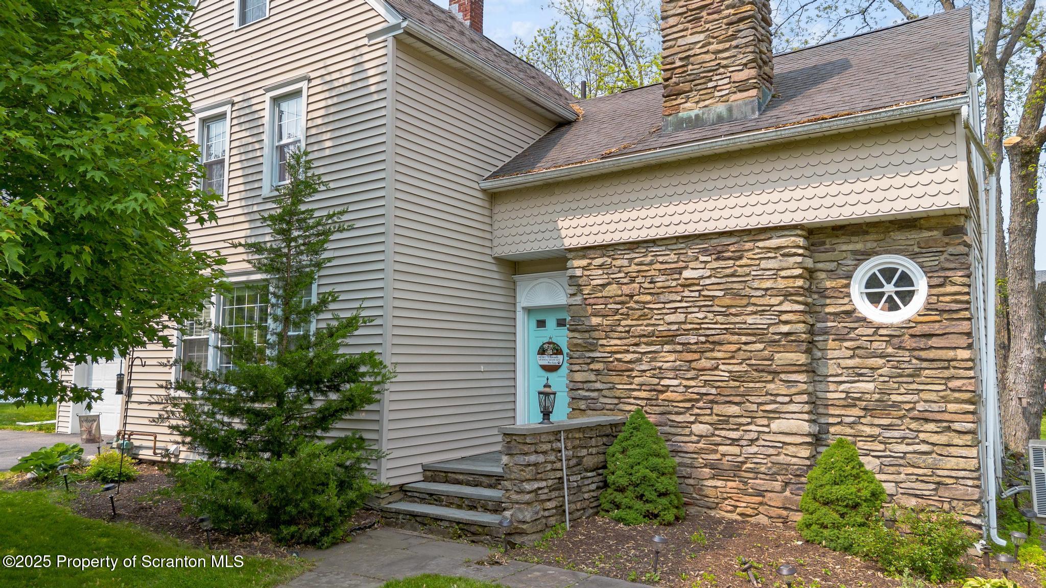 114 Spring Street Clarks Green, PA 18411 - Photo 1 of 47 a view of front door of house