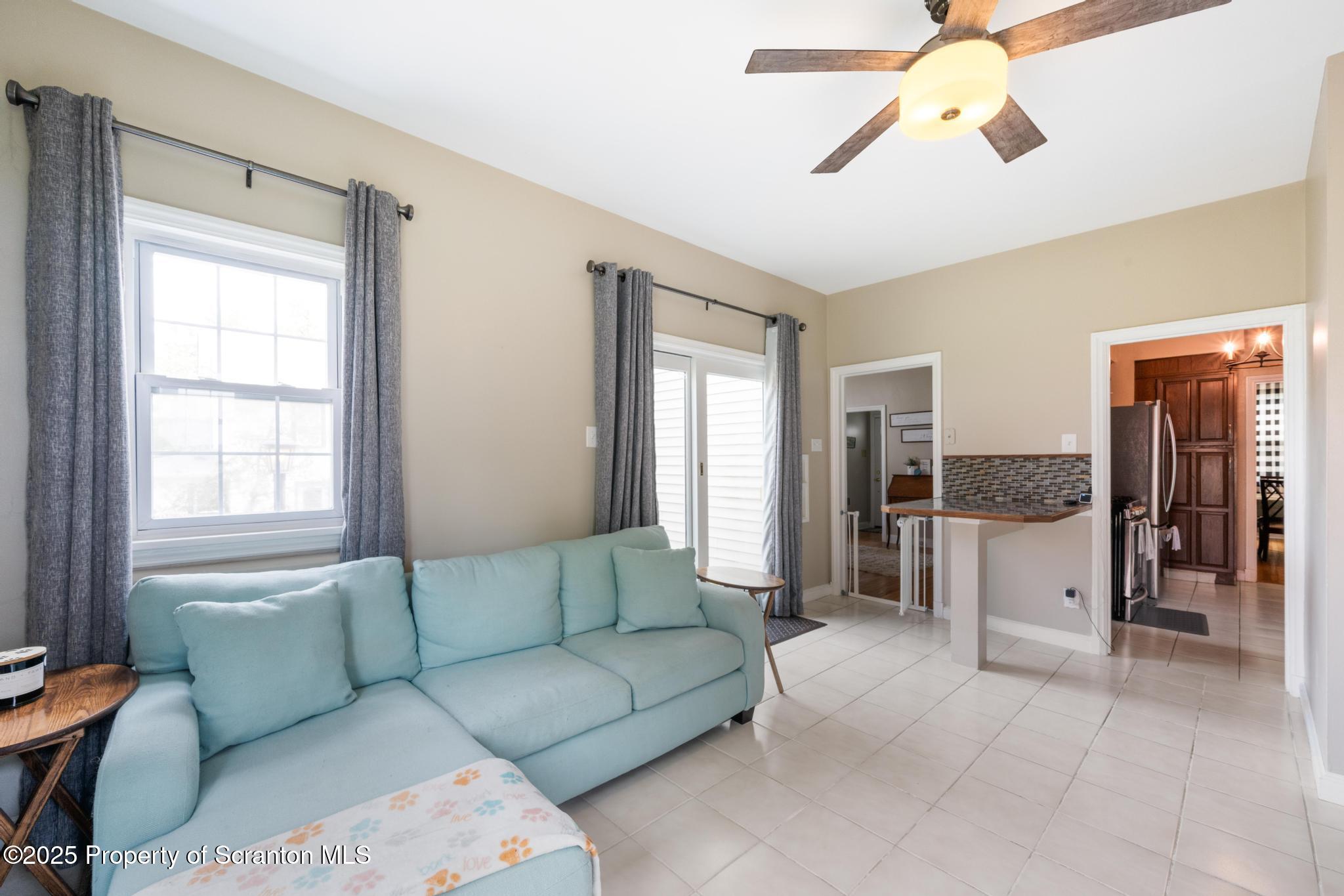 114 Spring Street Clarks Green, PA 18411 - Photo 11 of 47 a living room with furniture and a window